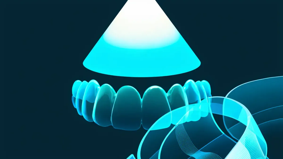 Dental clinician scanning a patient's upper arch with a modern intraoral scanner in an orthodontic operatory